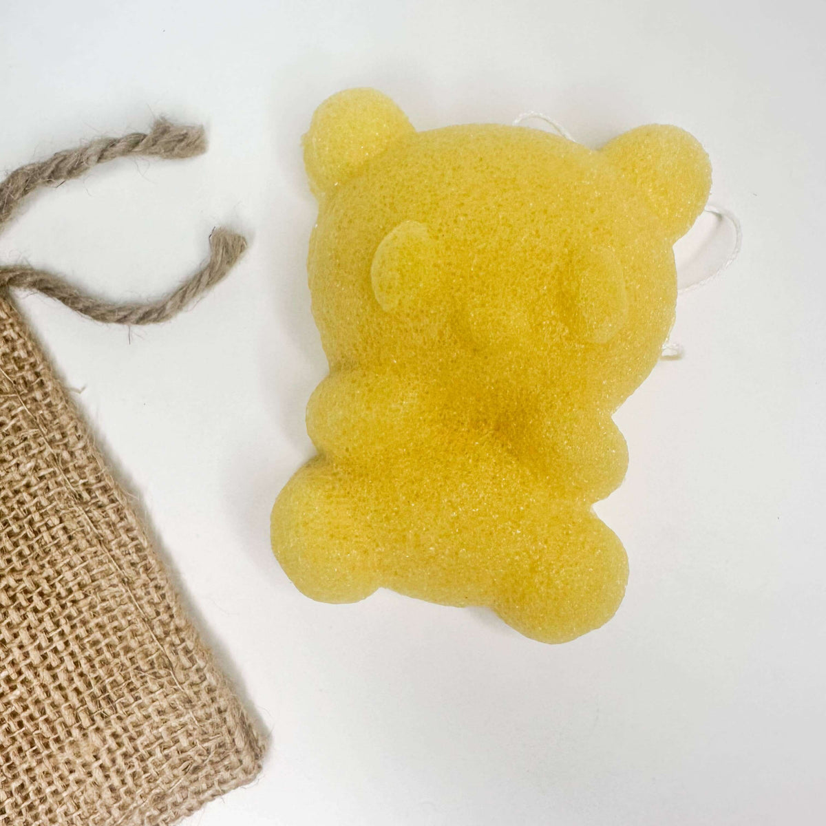 Natural Organic Konjac Facial Sponges shaped like a cute bear, perfect for gentle exfoliation and skincare.