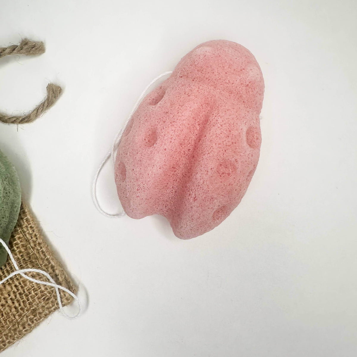 Natural Organic Konjac Facial Sponges in pink color, perfect for gentle exfoliation and skincare routine.