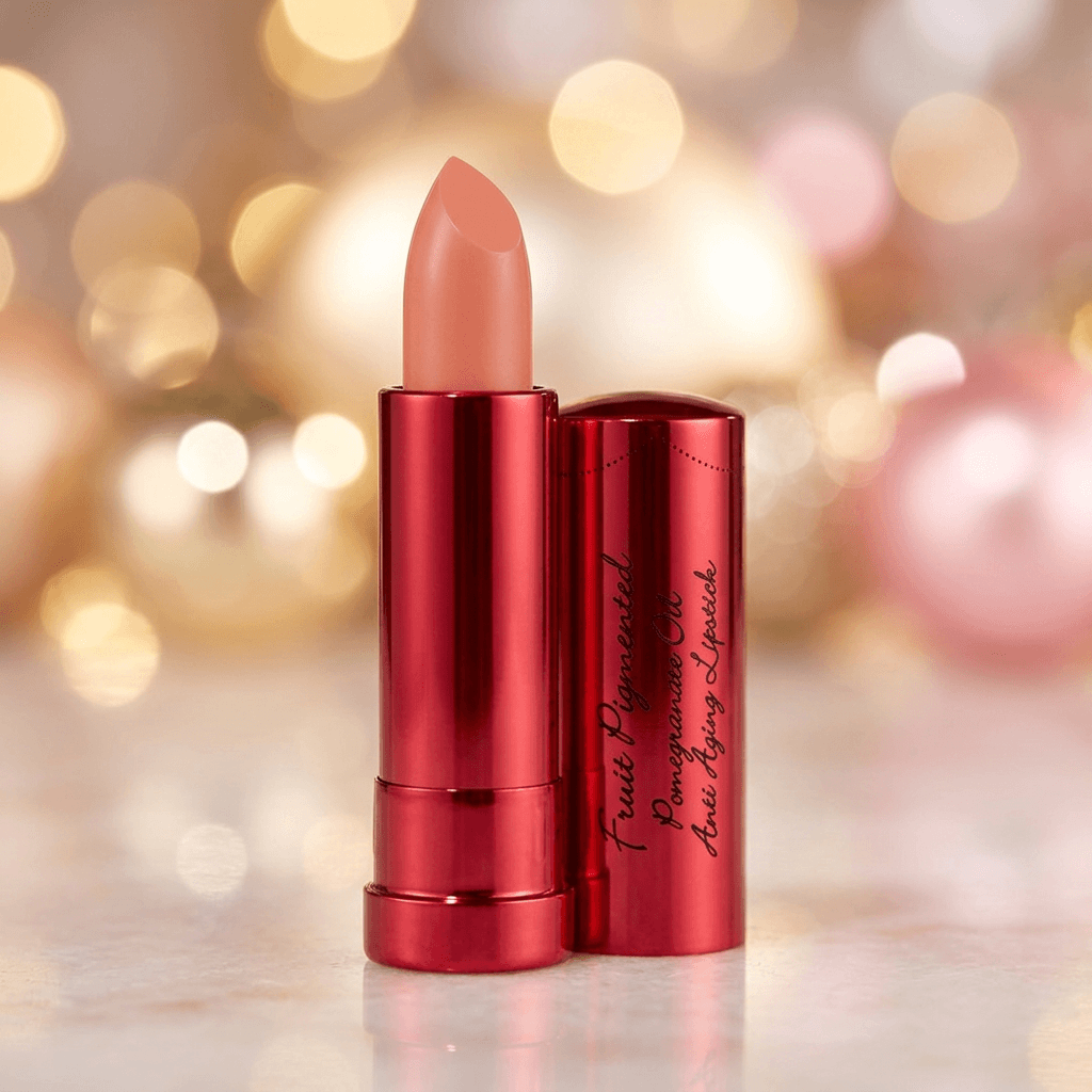 Peach Lipstick with red casing on a blurred background