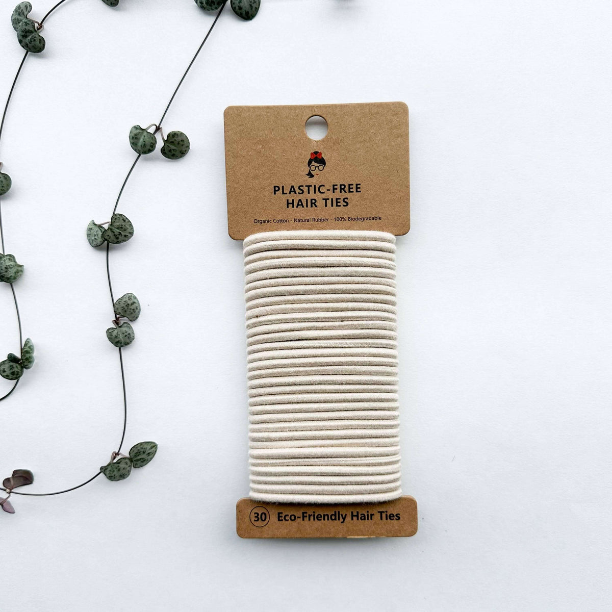 Pack of eco-friendly hair ties with a cardboard label on a white background