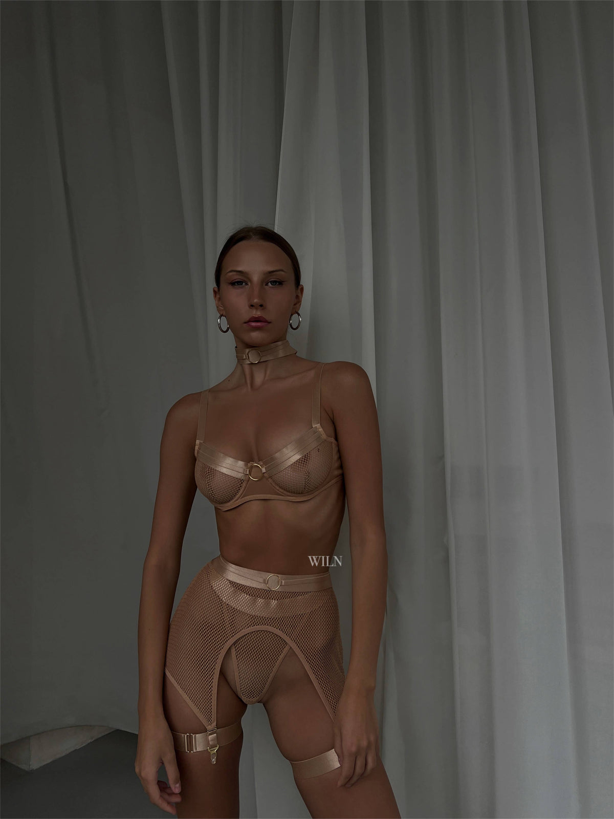 RAVENOUS 4 Piece Lace Lingerie Set featuring a model in soft, stretch-quality mesh with delicate lace detailing.
