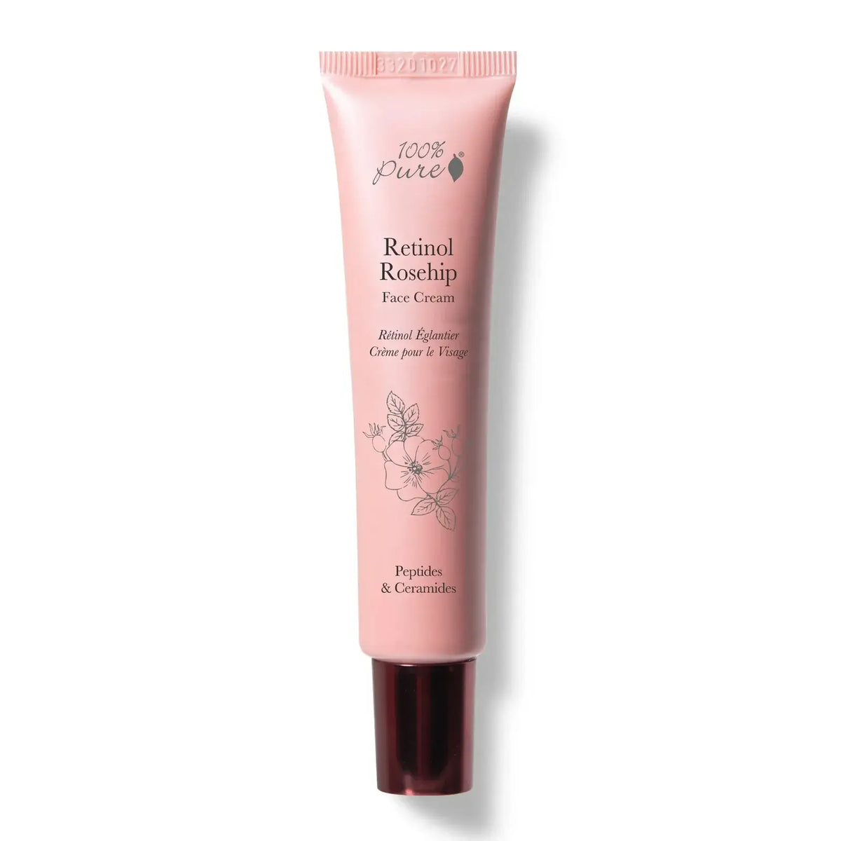 Pink tube of Retinol Roschip Face Cream on a white background