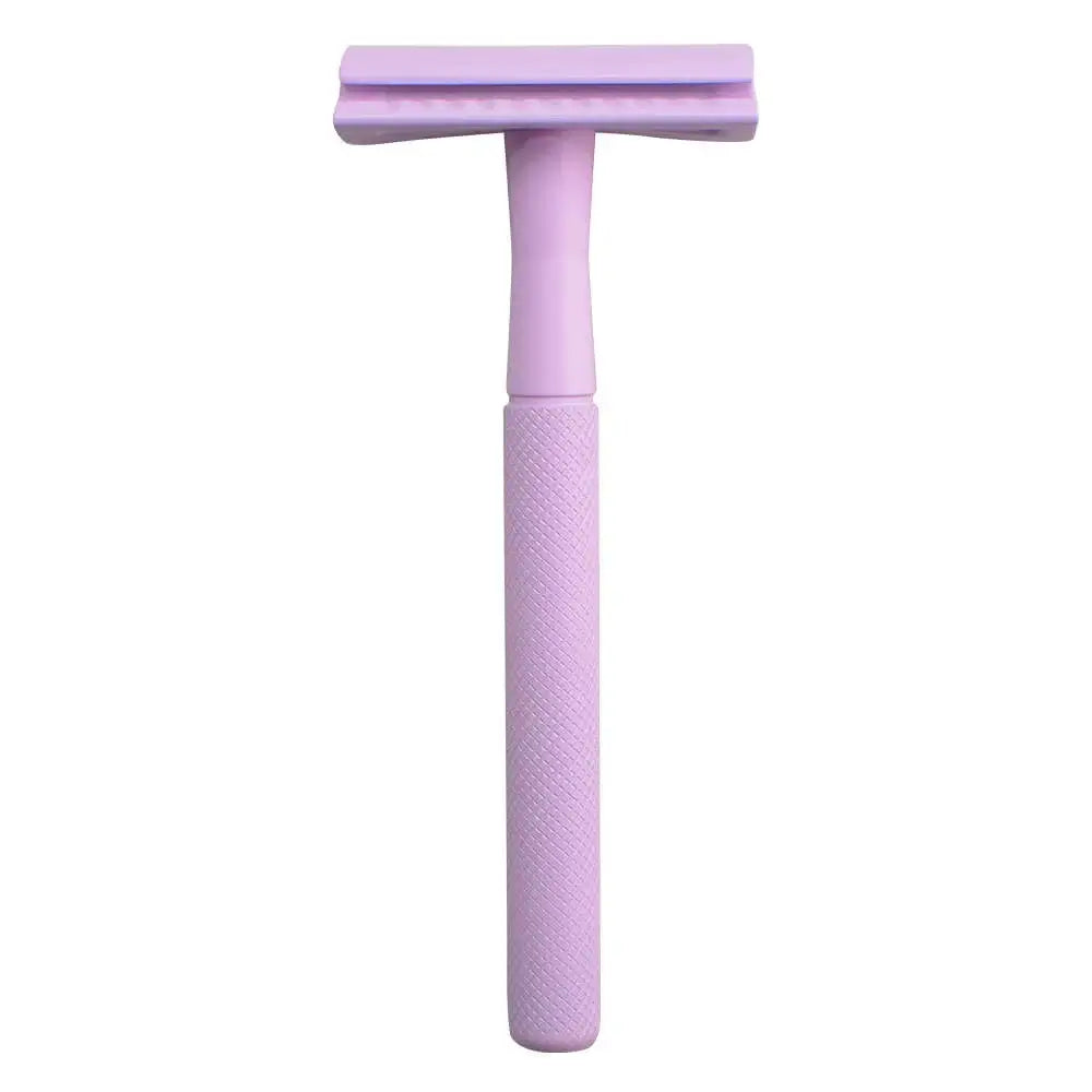 Purple safety razor on a white background