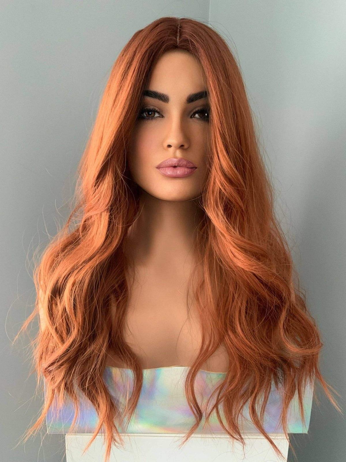 Riri Long Red Auburn Loose Curls Wig displayed on a mannequin with voluminous waves and rich auburn tones.