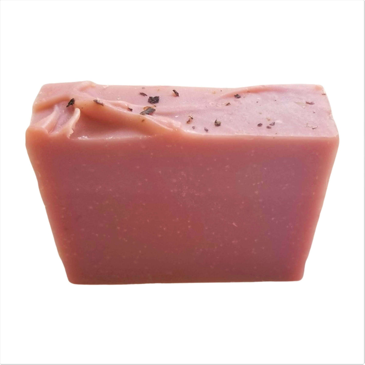 Rose Geranium Bar Soap - Soap Boutique, handcrafted pink artisan soap with rose fragrance and herbal garnish.