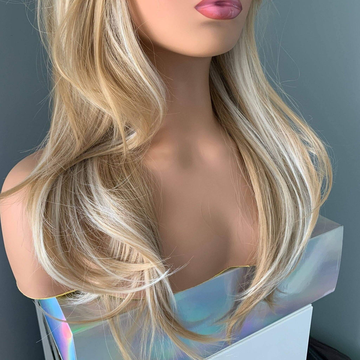 Rylee Mixed Blonde Wig with Layers showcasing soft, natural-looking layers and bangs for effortless glam.