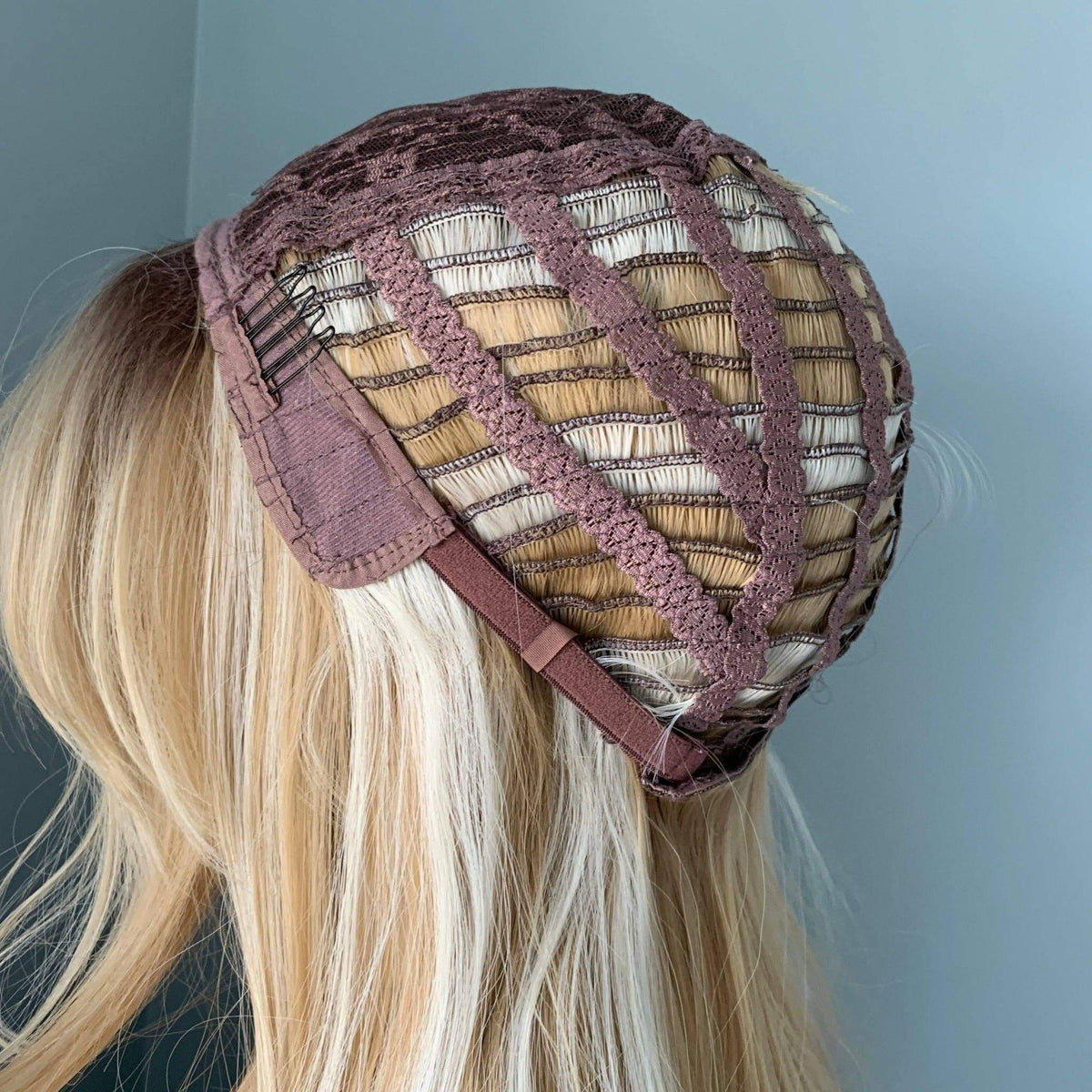 Wig cap construction for the Rylee Mixed Blonde Wig with Layers, showcasing the natural base and adjustable straps.