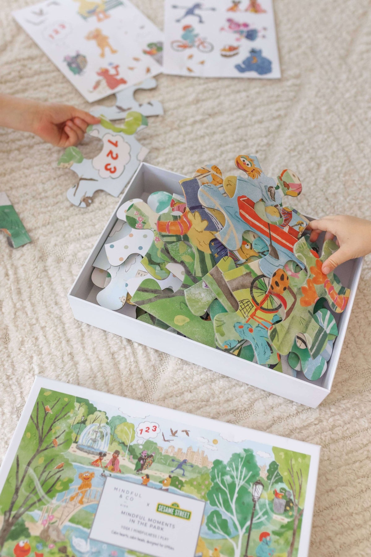 Mindful Moments with Sesame Street Floor Puzzle pieces and box, showing colorful and engaging design for children.