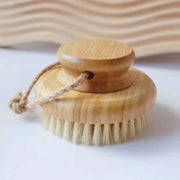 Wooden body brush with natural bristles on a white background