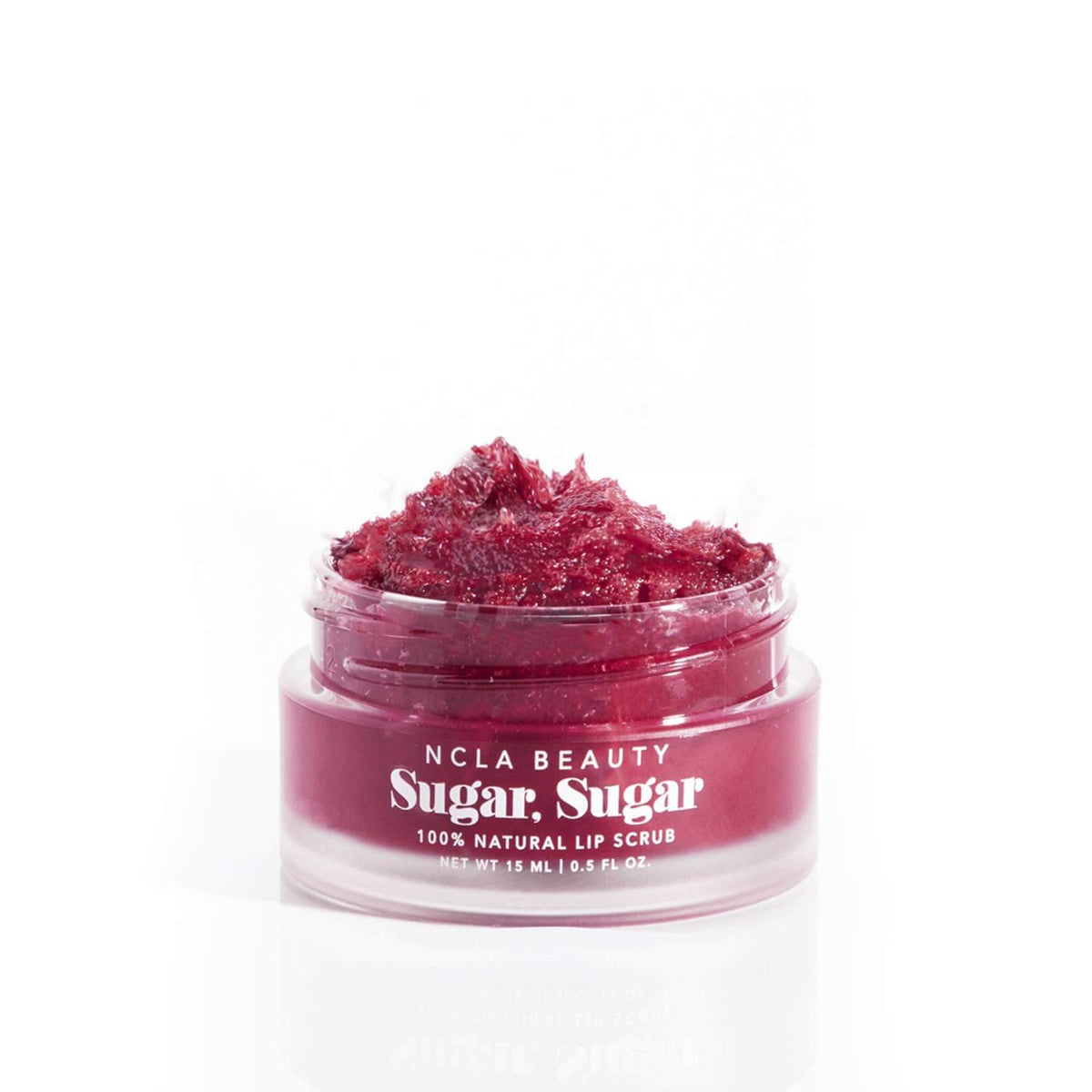 NCLA Beauty Sugar Sugar lip scrub in a clear container on a white background