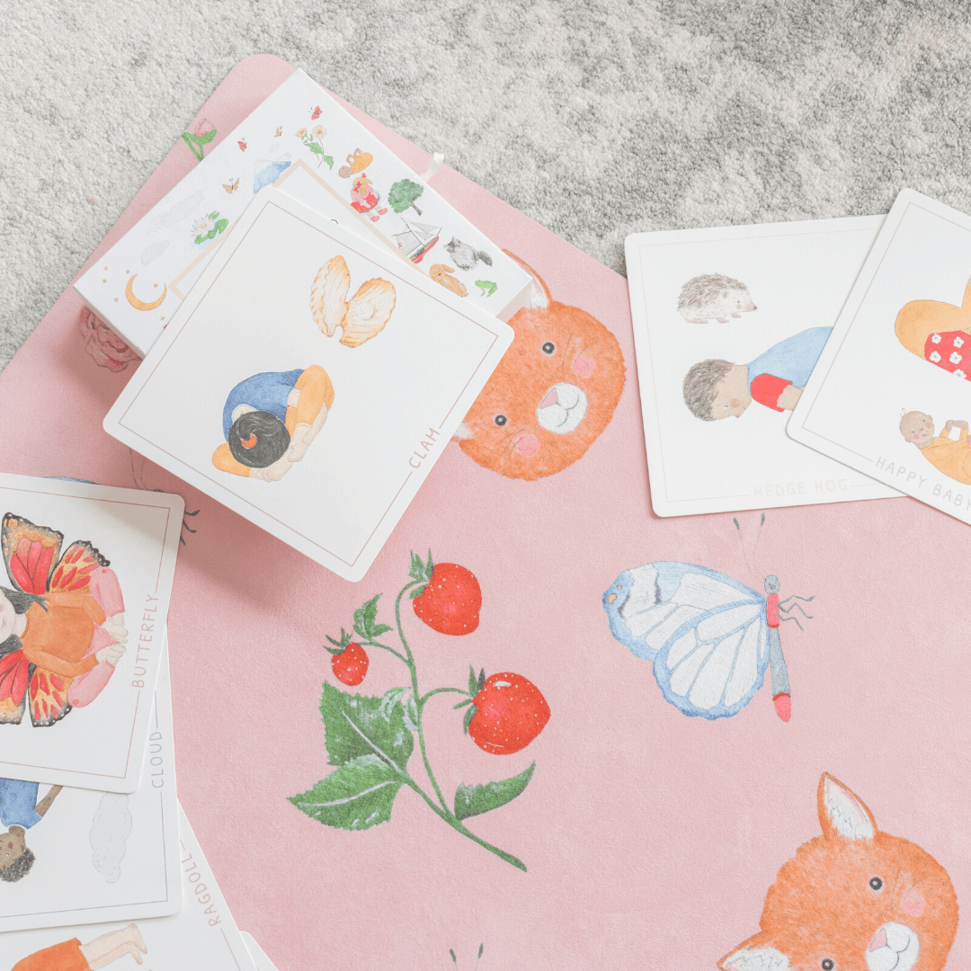 Sweet Print Kids Yoga Mat with colorful animal illustrations and cards for mindfulness and play.