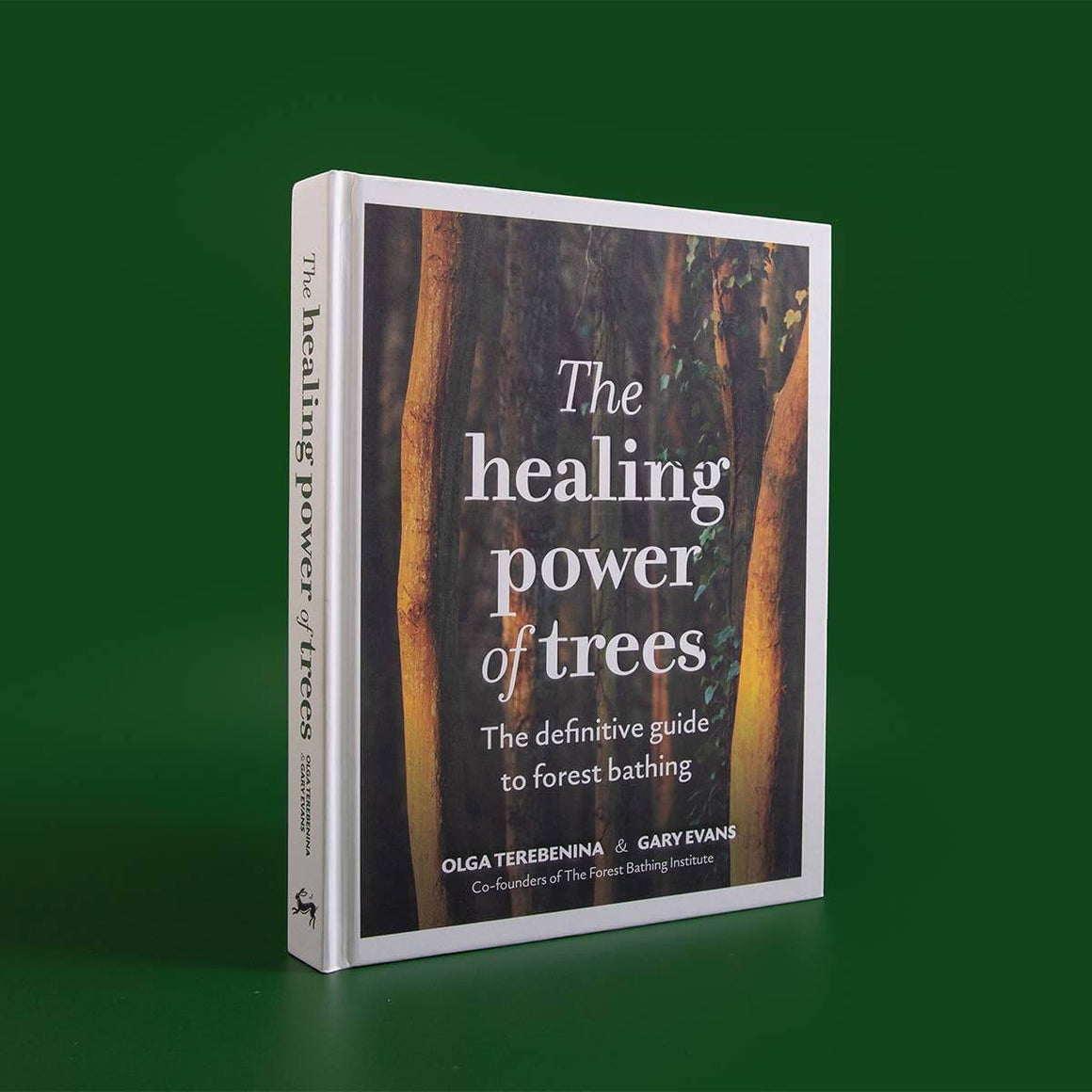 Book titled 'The Healing Power of Trees' on a green background