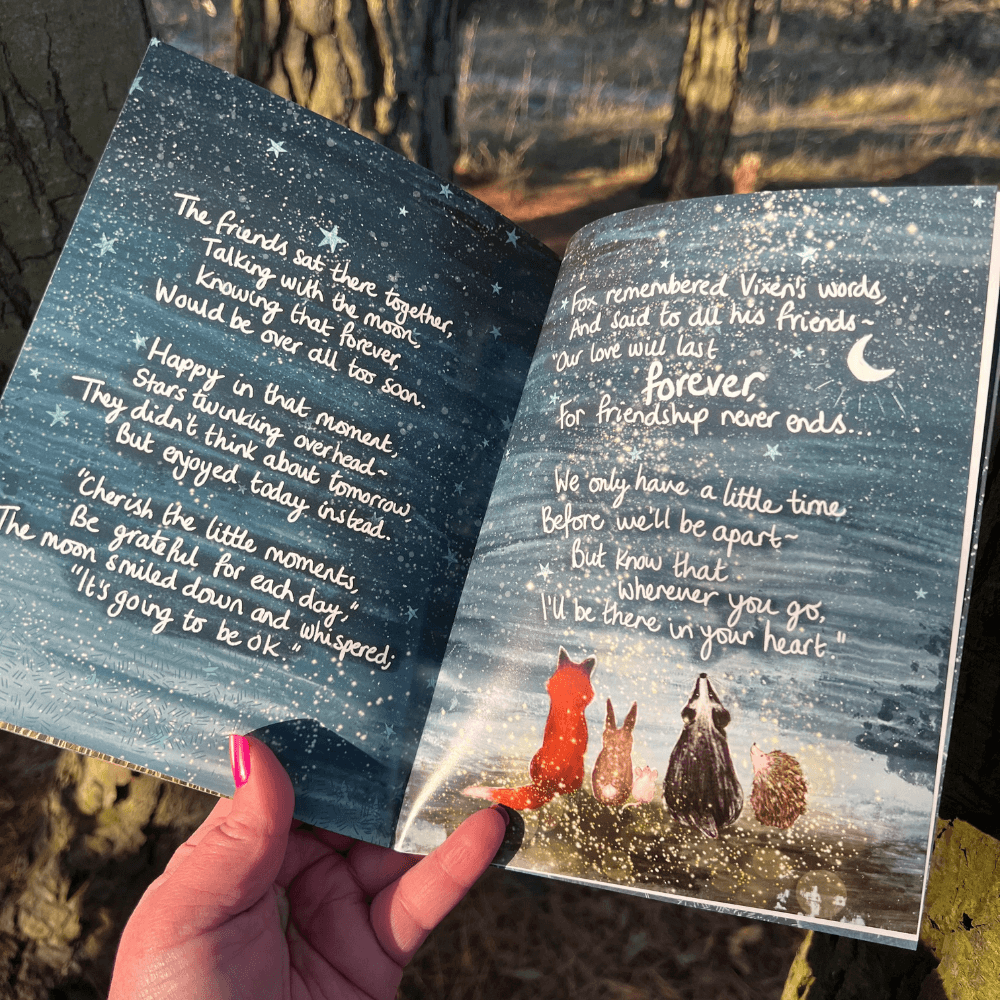 Inside pages of The Longest Night Paperback Book + bookmark featuring a heartfelt story about friendship.