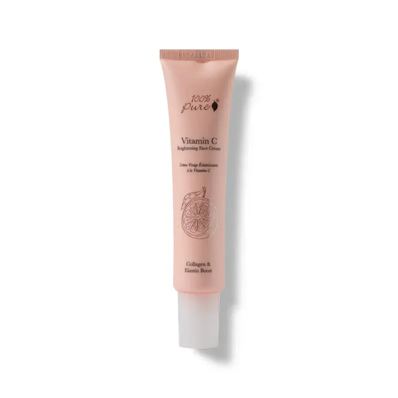 Pink skincare tube with '100% Pure' branding on a white background