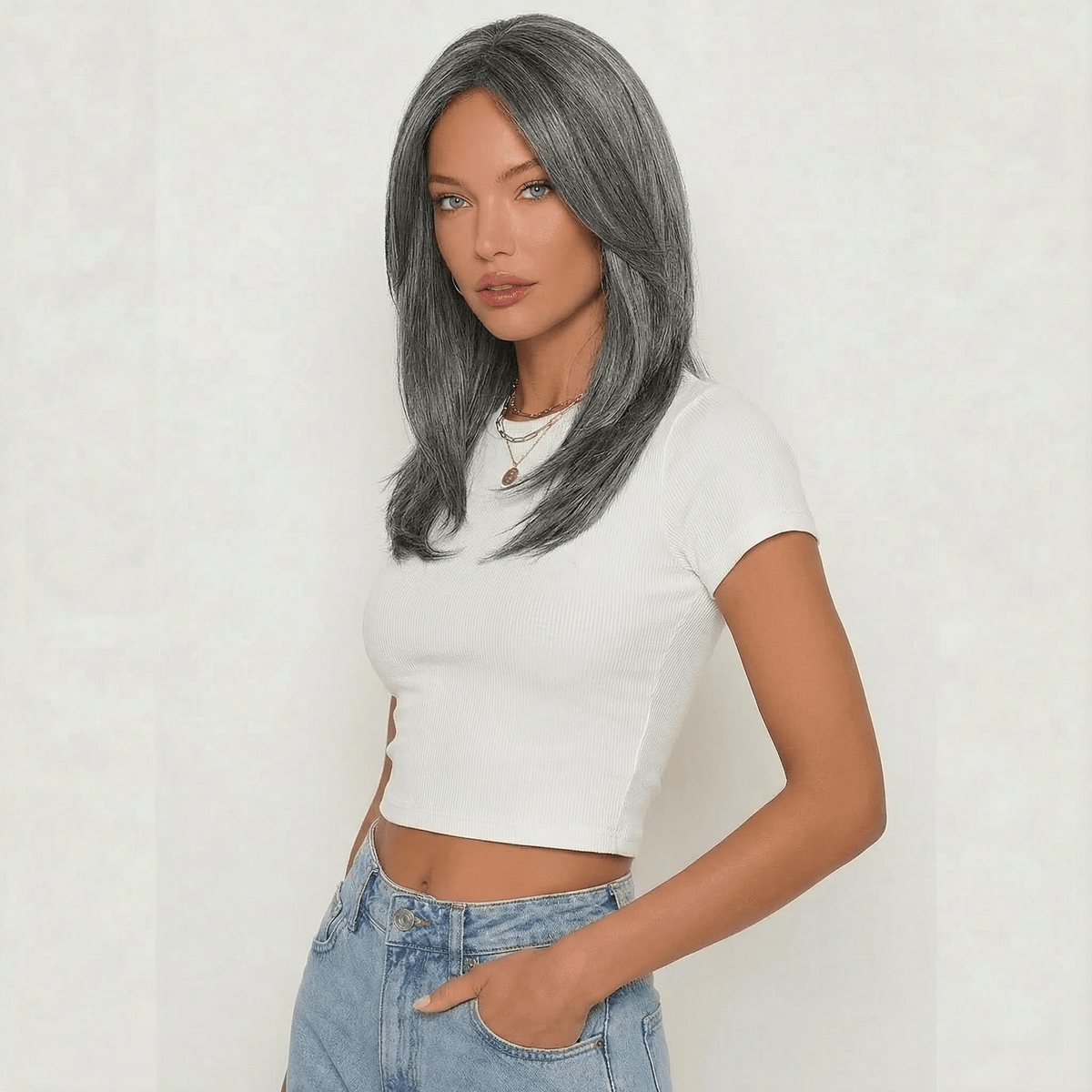 Model wearing Dixie Dark Grey Layered Wig, showcasing its elegant ash grey color and soft layers.