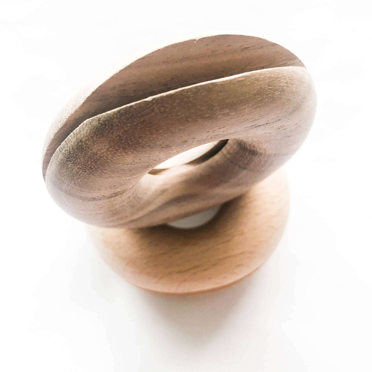 Wooden ring toy on a white background