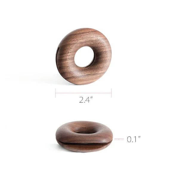 Wooden donut-shaped object with measurements on a white background