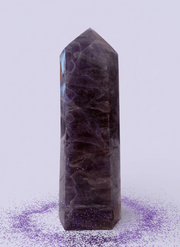 Madagascan Amethyst Crystal Prism showcasing a tall, polished purple crystal tower with sparkling purple accents.