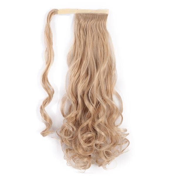 buttery blonde ponytail hair extension with soft curls and natural volume for elegant styling.