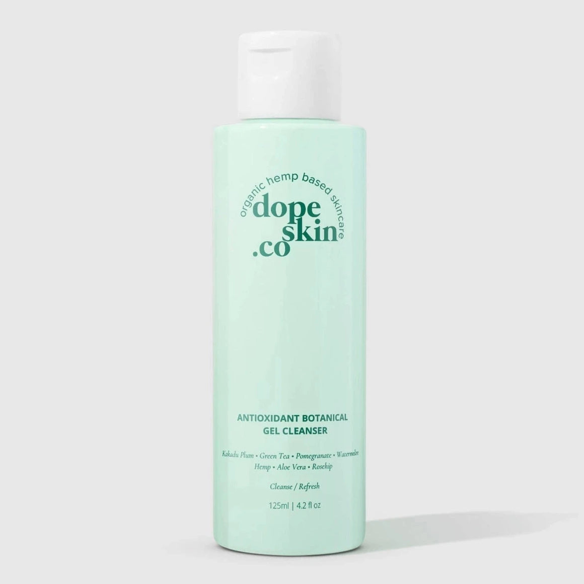 Bottle of 'dope skin co' cleanser on a white background