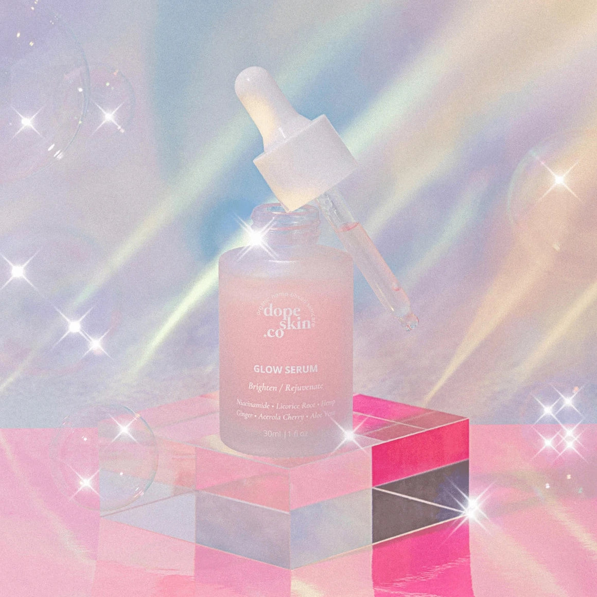 Dope Skin Glow Serum bottle with dropper on a colorful prism background, designed for radiant, luminous skin.