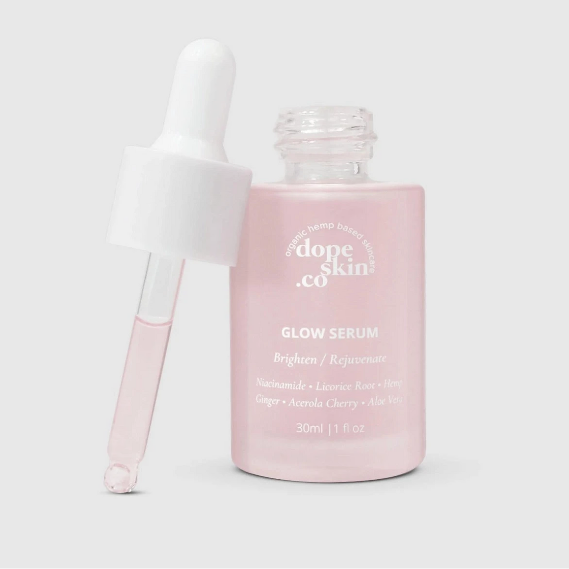 Glow Serum bottle with dropper, designed to brighten and rejuvenate skin, featuring a pink hue and natural ingredients.