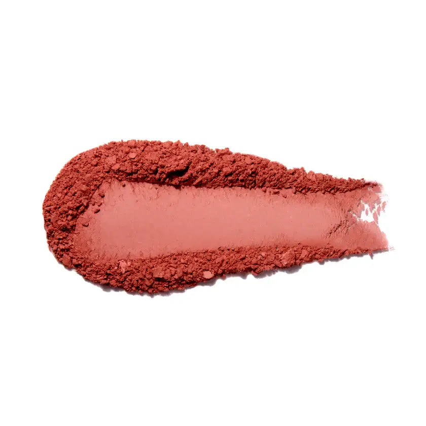 Natural fruit pigmented blush swatch showing rich, buildable color for enhancing complexion.