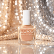 Bottle of ZERO nail polish with a sparkling background